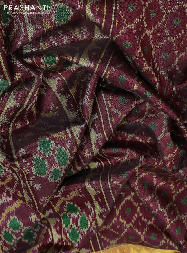 Rajkot patola silk saree deep maroon with allover ikat weaves and ikat woven border