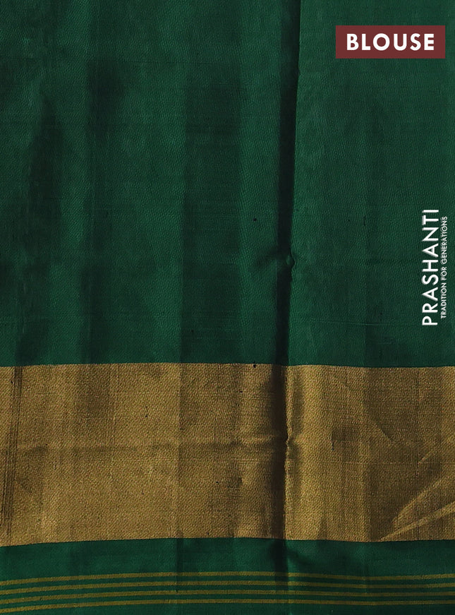 Rajkot patola silk saree off white  and green with allover ikat weaves and ikat woven zari border