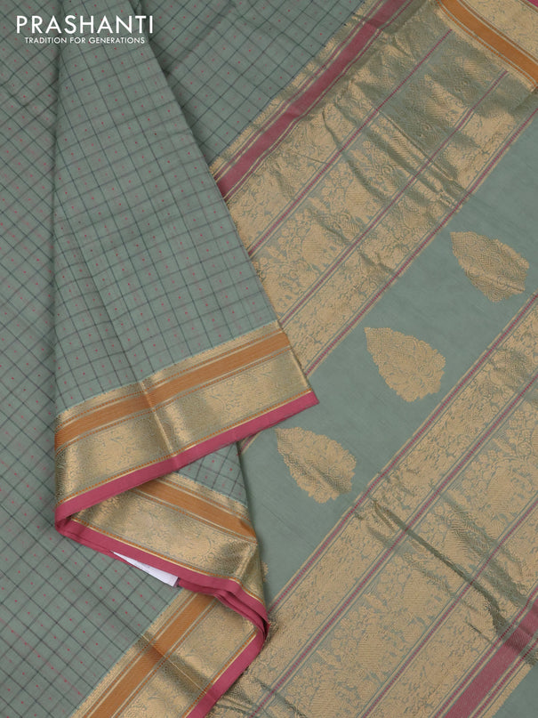 Kanchi cotton saree pastel green and pink with allover thread checks & buttas and thread woven border