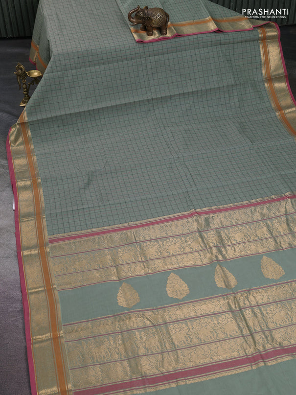 Kanchi cotton saree pastel green and pink with allover thread checks & buttas and thread woven border