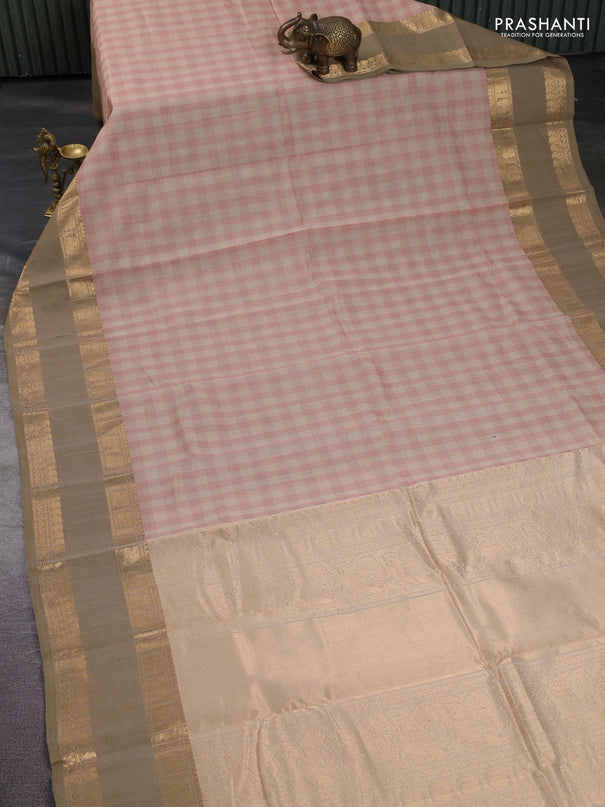 Kanchi cotton saree beige and elaichi green with allover thread checked pattern and rettapet zari woven border