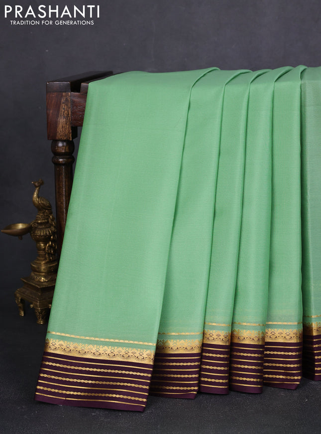 Pure mysore silk saree pista green and coffee brown with plain body and zari woven border