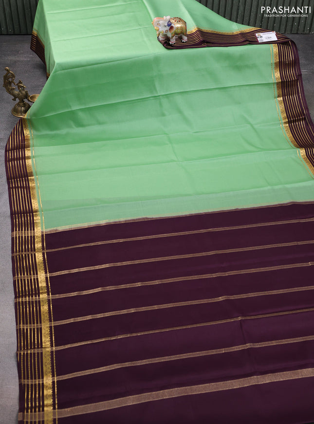 Pure mysore silk saree pista green and coffee brown with plain body and zari woven border