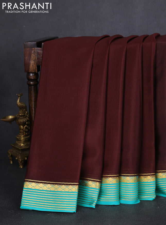 Pure mysore silk saree brown and teal green with plain body and zari woven border