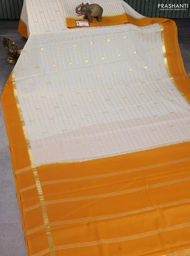 Pure mysore silk saree cream and mustard yellow with allover zari checked pattern and paisley zari woven simple border