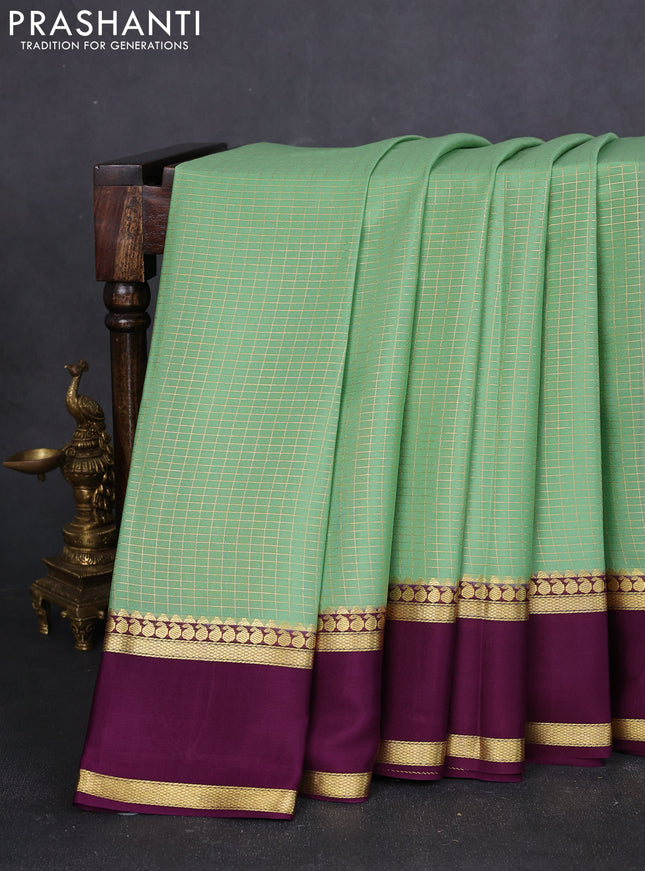 Pure mysore silk saree pista green and purple with allover zari checked pattern and rettapet zari woven border