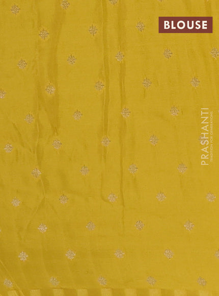 Semi mysore silk saree bottle green and yellow with plain body and long zari woven border