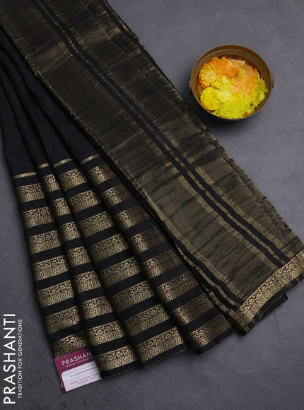 Semi mysore silk saree black and orange with plain body and long zari woven border