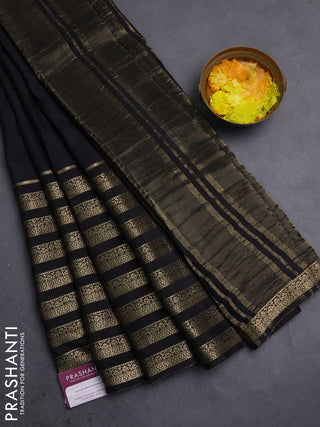 Semi mysore silk saree black and orange with plain body and long zari woven border