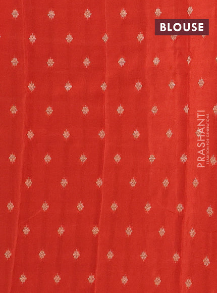 Semi mysore silk saree black and orange with plain body and long zari woven border