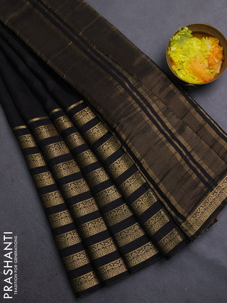 Semi mysore silk saree black and orange with plain body and long zari woven border