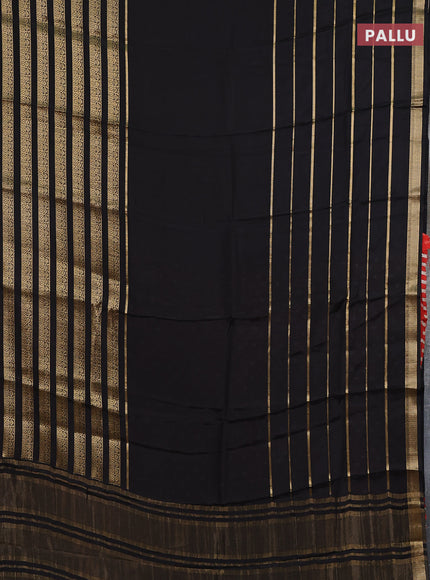 Semi mysore silk saree black and orange with plain body and long zari woven border