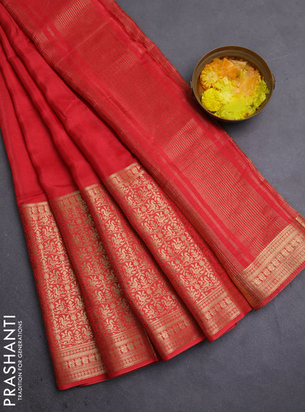 Semi mysore silk saree orange with plain body and long annam zari woven border