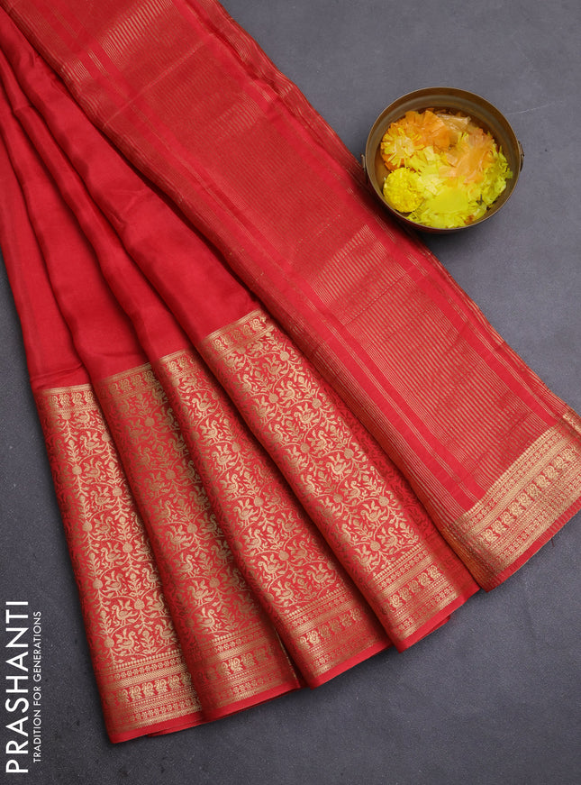 Semi mysore silk saree orange with plain body and long annam zari woven border