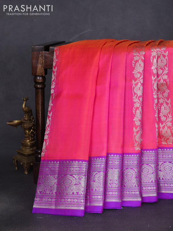 Venkatagiri silk saree dual shade of pinkish orange and purple with allover silver zari weaves and silver zari woven border