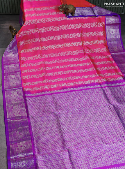 Venkatagiri silk saree dual shade of pinkish orange and purple with allover silver zari weaves and silver zari woven border