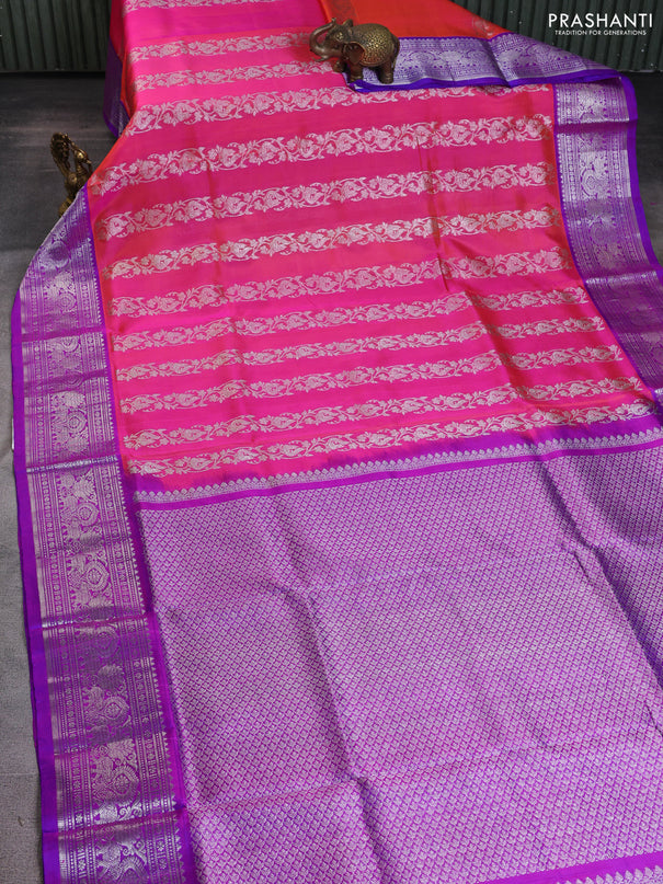 Venkatagiri silk saree dual shade of pinkish orange and purple with allover silver zari weaves and silver zari woven border