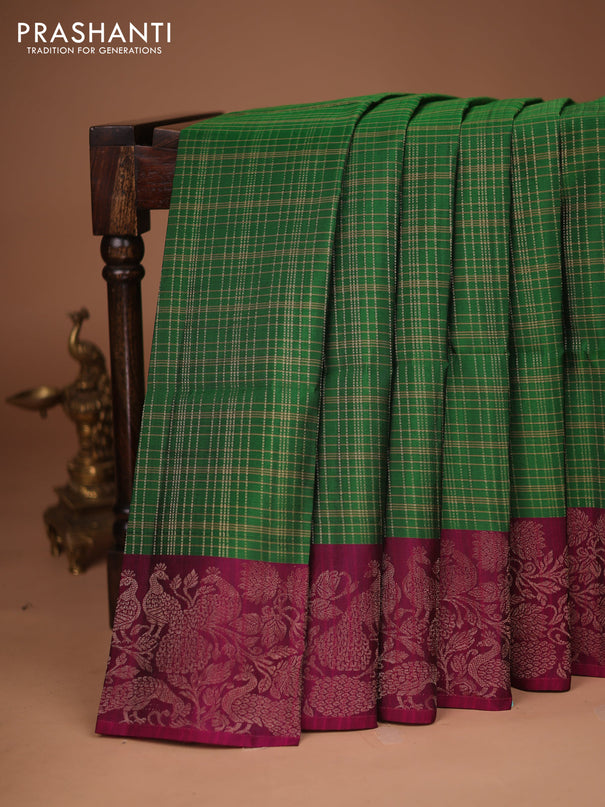 Kanchipuram soft silk saree green and dark magenta pink with allover zari woven checked pattern and peacock design zari woven border