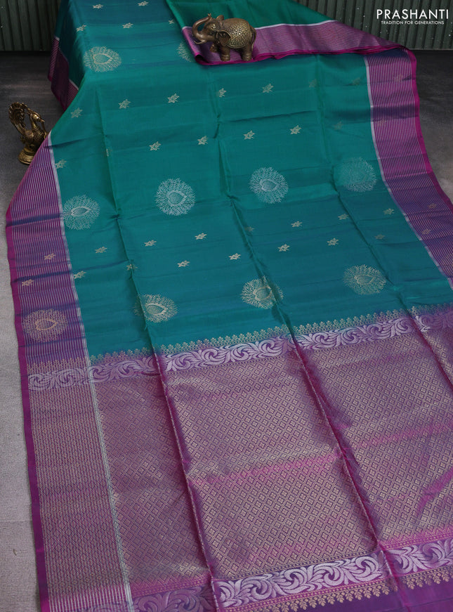 Kanchipuram soft silk saree peacock green and dual shade of magenta with zari woven buttas and zari woven border