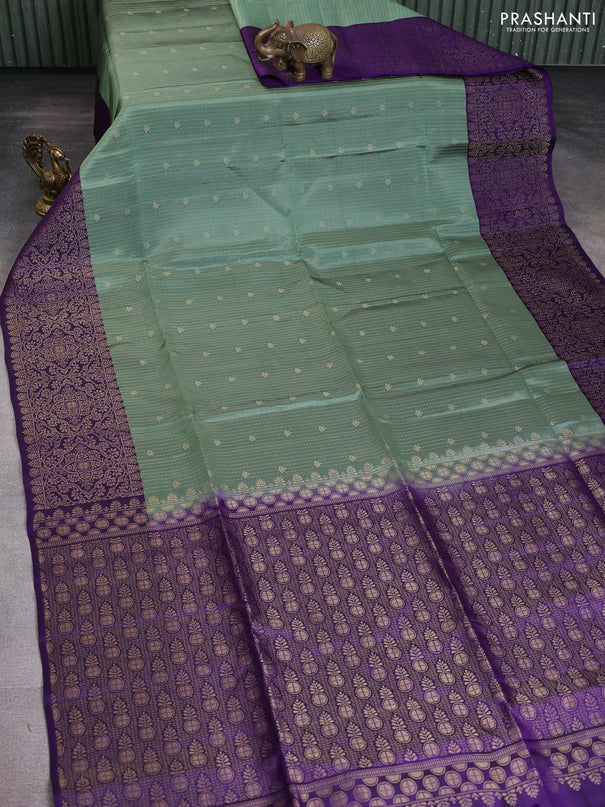 Kanchipuram soft silk saree pastel green shade and violet with allover zari woven brocade weaves and long zari woven border