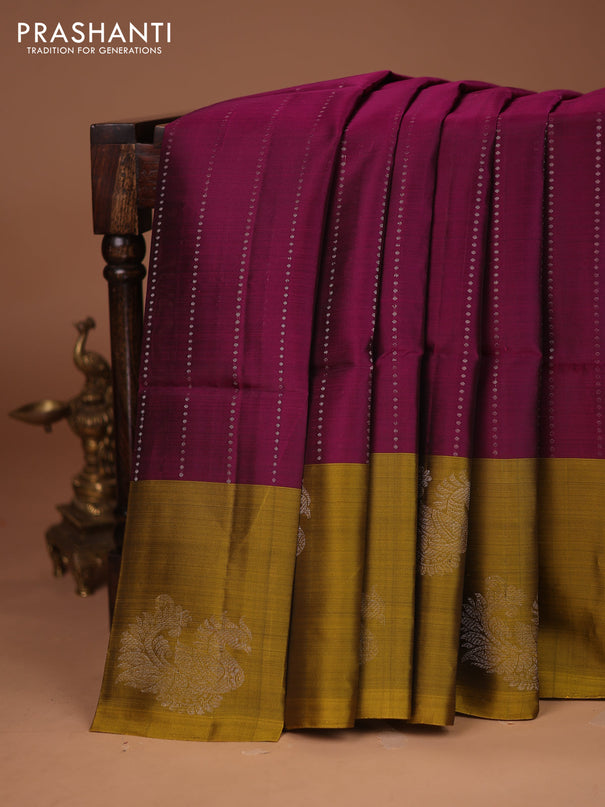 Kanchipuram soft silk saree purple and mustard yellow with allover silver zari weaves and long silver zari woven annam border