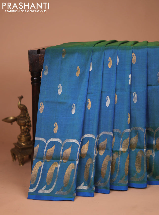Pure uppada silk saree dual shade of cs blue with silver & gold paisley zari woven buttas and rich zari woven border
