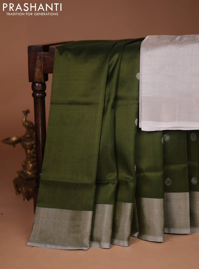 Pure uppada silk saree sap green with allover silver zari woven buttas and silver zari woven border