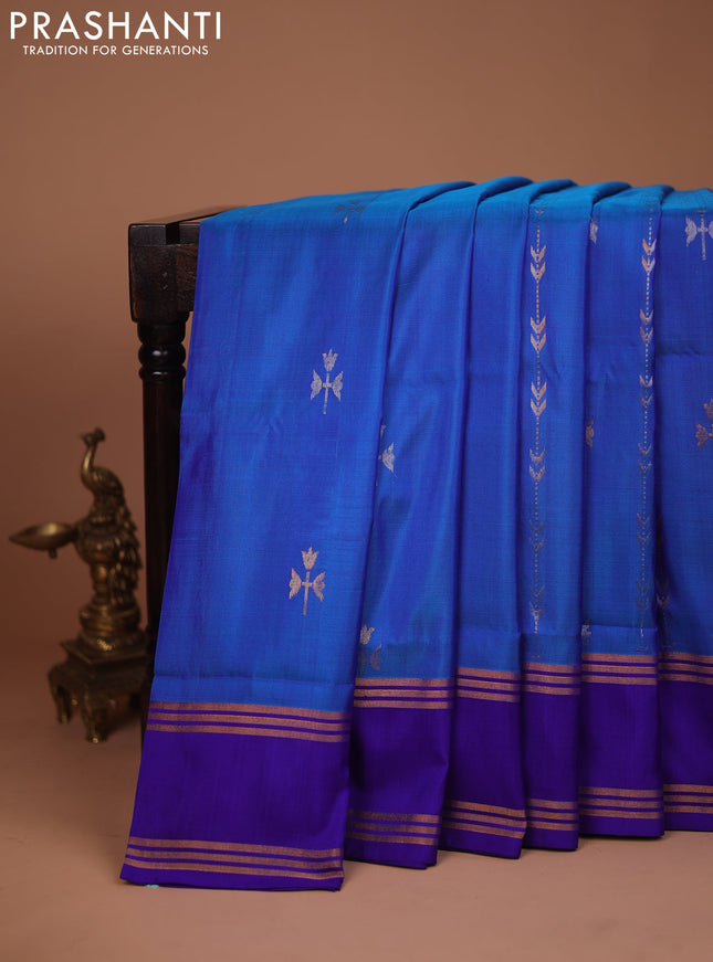 Pure uppada silk saree cs blue and blue with allover silver & gold zari weaves and rettapet zari woven border