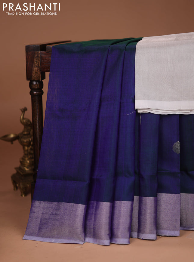 Pure uppada silk saree dual shade of bluish green with silver zari woven coin buttas and silver zari woven border