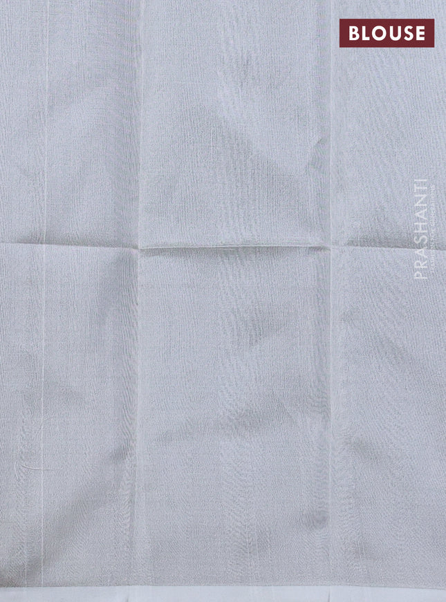 Pure uppada silk saree dual shade of bluish green with silver zari woven coin buttas and silver zari woven border