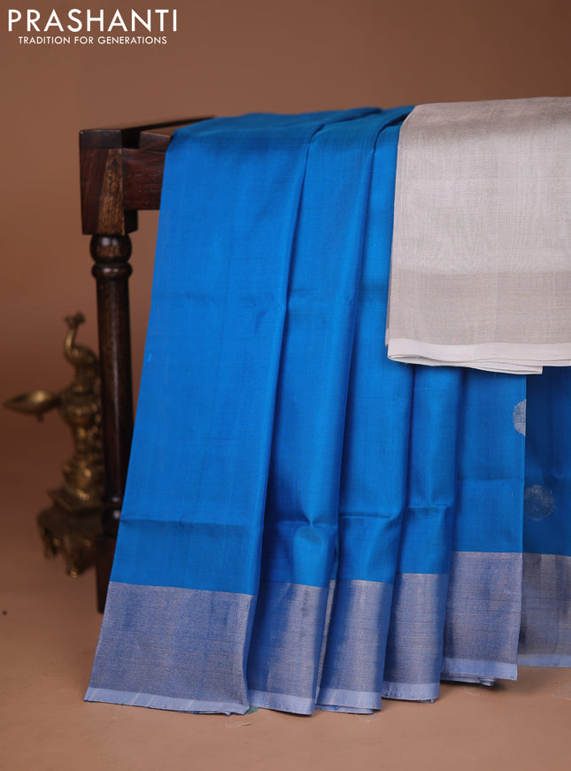 Pure uppada silk saree cs blue with silver zari woven coin buttas and silver zari woven border