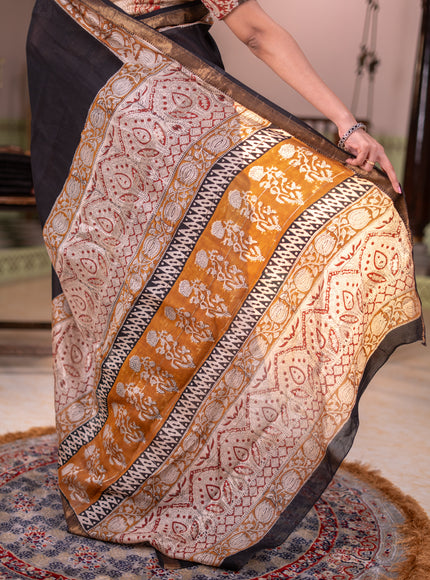 Chanderi bagru partly saree black and dark mustard with plain body and kalamkari printed pallu