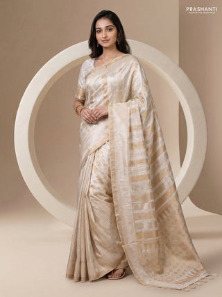 Semi kanchipuram partly saree off white with allover silver & zari weaves and rettapet zari woven border