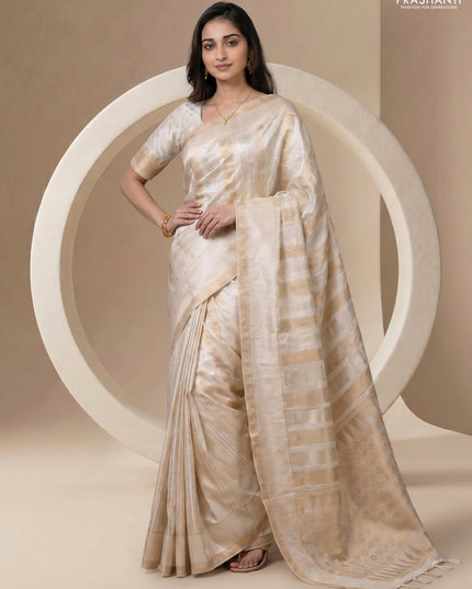 Semi kanchipuram partly saree off white with allover silver & zari weaves and rettapet zari woven border
