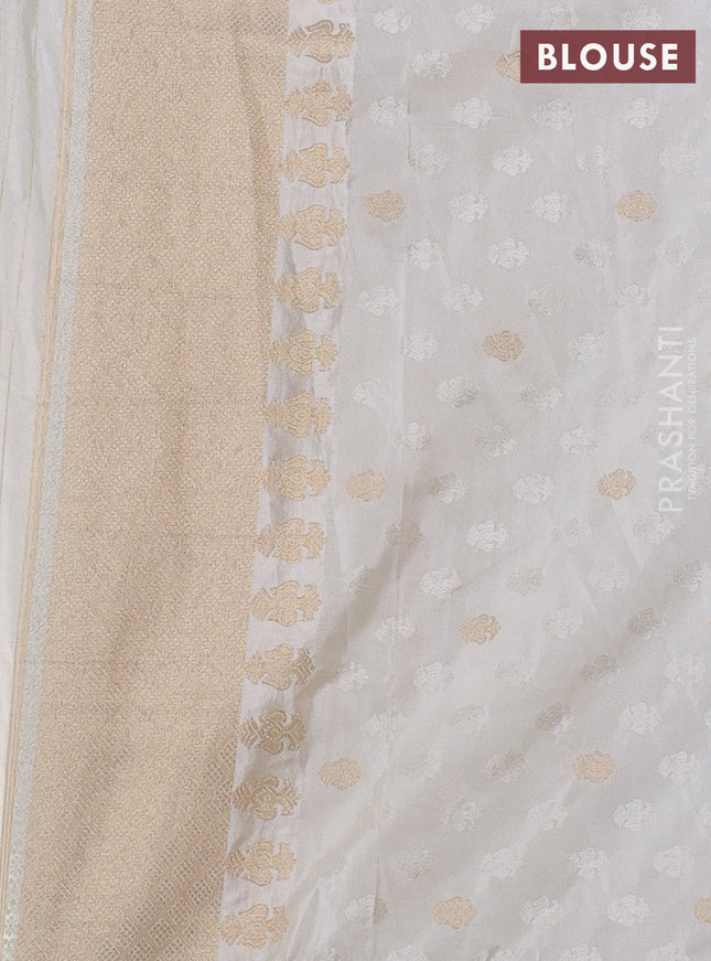 Semi kanchipuram partly saree off white with allover silver & zari weaves and rettapet zari woven border