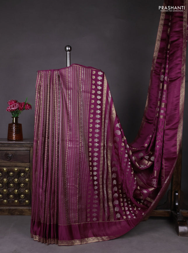 Semi kanchipuram partly saree wine shade with allover silver & zari weaves and rettapet zari woven border