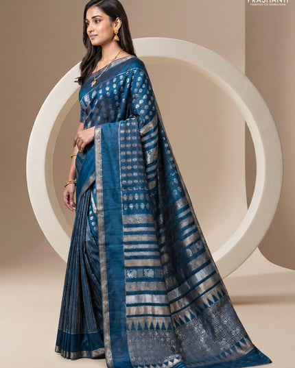 Semi kanchipuram partly saree peacock blue with allover silver & zari weaves and rettapet zari woven border