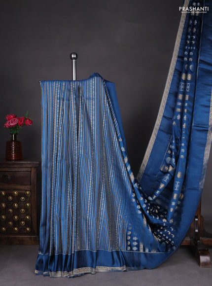 Semi kanchipuram partly saree peacock blue with allover silver & zari weaves and rettapet zari woven border