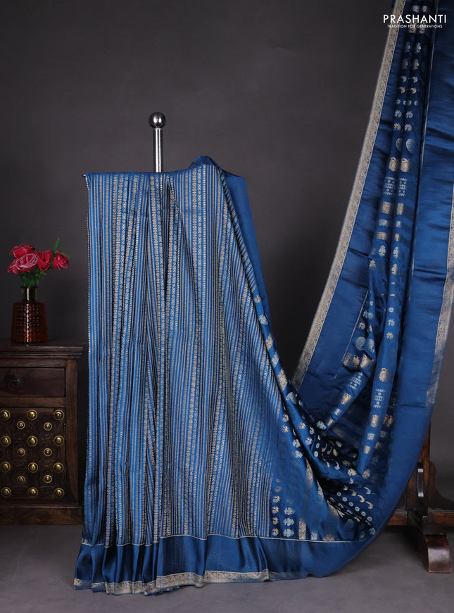 Semi kanchipuram partly saree peacock blue with allover silver & zari weaves and rettapet zari woven border