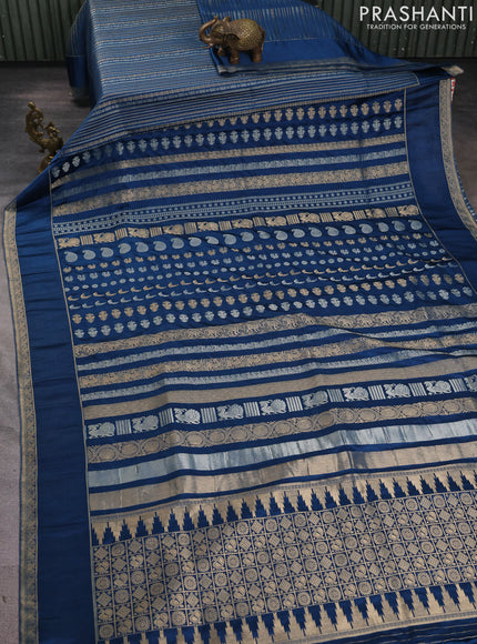 Semi kanchipuram partly saree peacock blue with allover silver & zari weaves and rettapet zari woven border