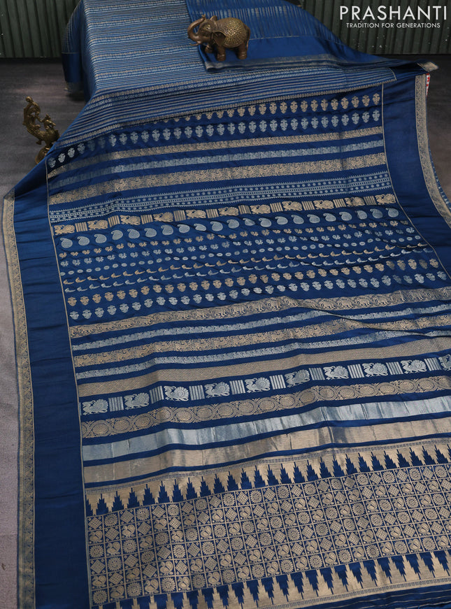 Semi kanchipuram partly saree peacock blue with allover silver & zari weaves and rettapet zari woven border