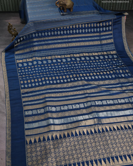 Semi kanchipuram partly saree peacock blue with allover silver & zari weaves and rettapet zari woven border
