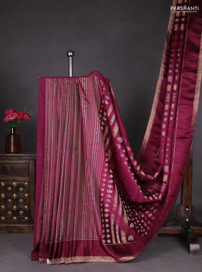 Semi kanchipuram partly saree wine shade with allover silver & zari weaves and rettapet zari woven border