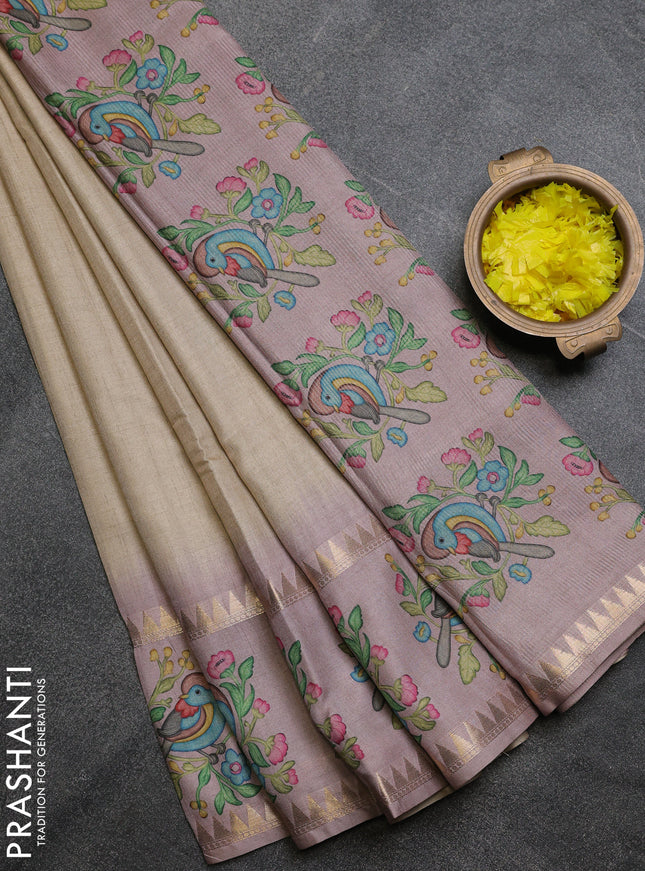 Art tussar saree beige and pastel purple with plain body and tanjore printed border