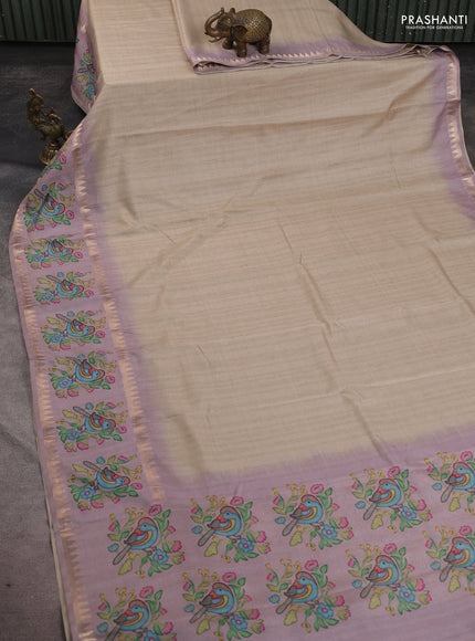 Art tussar saree beige and pastel purple with plain body and tanjore printed border