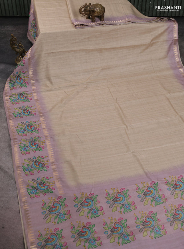 Art tussar saree beige and pastel purple with plain body and tanjore printed border