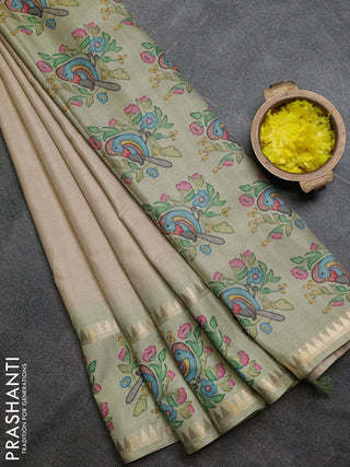 Art tussar saree beige and pista green with plain body and tanjore printed border