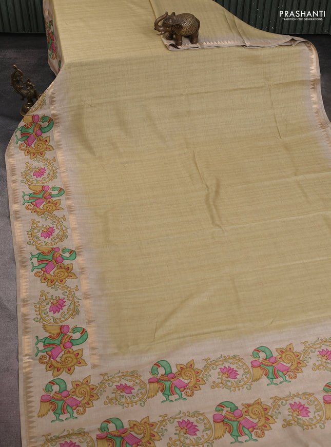 Art tussar saree pale yellow and beige with plain body and tanjore printed border