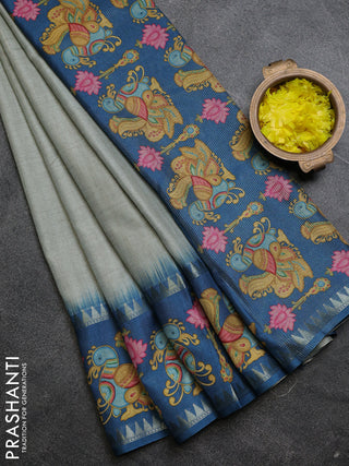 Art tussar saree pastel blue and peacock blue with plain body and tanjore printed border