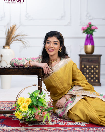 Art tussar saree lime green and beige with plain body and tanjore printed border